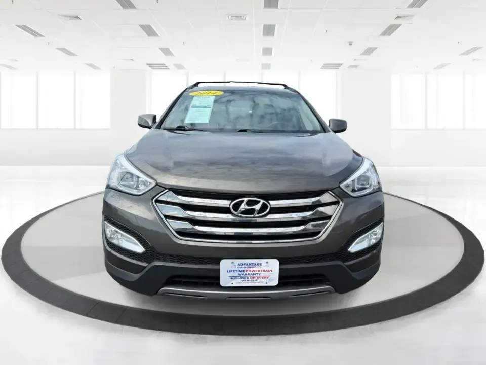 2014 Hyundai Santa Fe Sport 2.4 AWD (5XYZUDLB0EG) with an 2.4L L4 DOHC 16V engine, 6-Speed Automatic transmission, located at 4508 South Dixie Dr, Moraine, OH, 45439, (937) 908-9800, 39.689976, -84.218452 - Picture your next weekend escape: loading up the family, pointing the nose toward the MetroParks, and cruising I-75 with room for everyone and everything-without feeling like you're driving a bus. This 2014 Hyundai Santa Fe 2.4L in Cabo Bronze is a practical, road-trip-ready SUV that fits real life- Photo#7