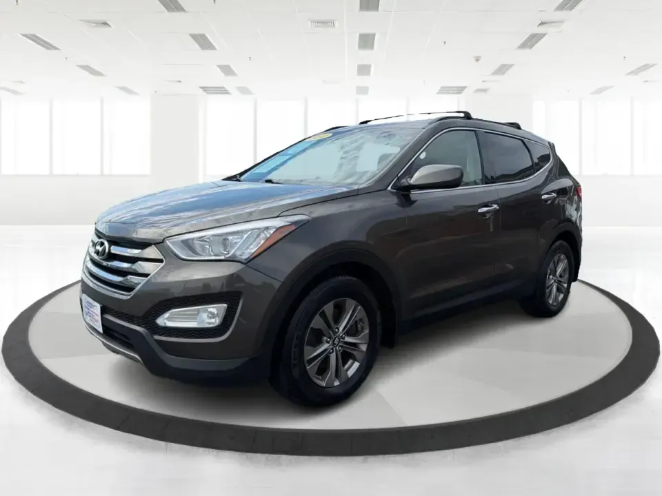2014 Hyundai Santa Fe Sport 2.4 AWD (5XYZUDLB0EG) with an 2.4L L4 DOHC 16V engine, 6-Speed Automatic transmission, located at 4508 South Dixie Dr, Moraine, OH, 45439, (937) 908-9800, 39.689976, -84.218452 - Picture your next weekend escape: loading up the family, pointing the nose toward the MetroParks, and cruising I-75 with room for everyone and everything-without feeling like you're driving a bus. This 2014 Hyundai Santa Fe 2.4L in Cabo Bronze is a practical, road-trip-ready SUV that fits real life- Photo#8