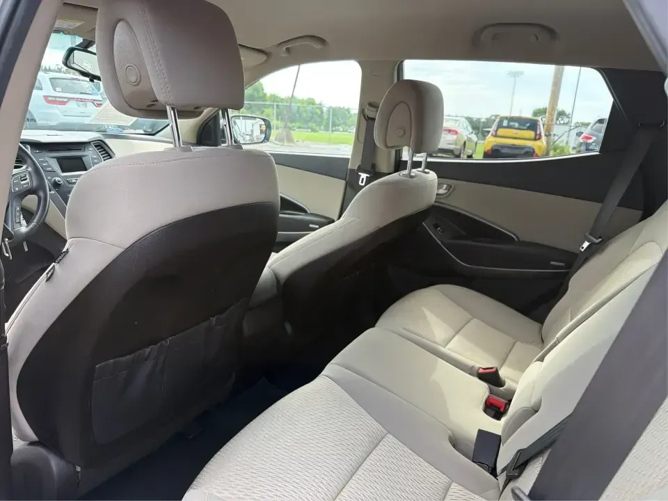2014 Hyundai Santa Fe Sport 2.4 AWD (5XYZUDLB0EG) with an 2.4L L4 DOHC 16V engine, 6-Speed Automatic transmission, located at 4508 South Dixie Dr, Moraine, OH, 45439, (937) 908-9800, 39.689976, -84.218452 - Picture your next weekend escape: loading up the family, pointing the nose toward the MetroParks, and cruising I-75 with room for everyone and everything-without feeling like you're driving a bus. This 2014 Hyundai Santa Fe 2.4L in Cabo Bronze is a practical, road-trip-ready SUV that fits real life- Photo#10