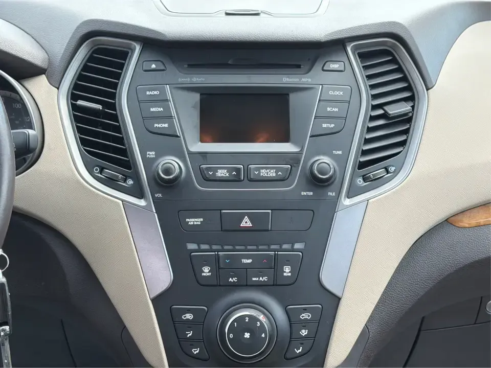2014 Hyundai Santa Fe Sport 2.4 AWD (5XYZUDLB0EG) with an 2.4L L4 DOHC 16V engine, 6-Speed Automatic transmission, located at 4508 South Dixie Dr, Moraine, OH, 45439, (937) 908-9800, 39.689976, -84.218452 - Picture your next weekend escape: loading up the family, pointing the nose toward the MetroParks, and cruising I-75 with room for everyone and everything-without feeling like you're driving a bus. This 2014 Hyundai Santa Fe 2.4L in Cabo Bronze is a practical, road-trip-ready SUV that fits real life- Photo#13