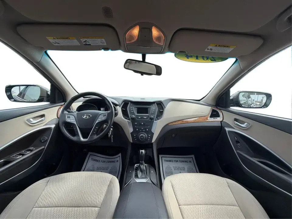 2014 Hyundai Santa Fe Sport 2.4 AWD (5XYZUDLB0EG) with an 2.4L L4 DOHC 16V engine, 6-Speed Automatic transmission, located at 4508 South Dixie Dr, Moraine, OH, 45439, (937) 908-9800, 39.689976, -84.218452 - Picture your next weekend escape: loading up the family, pointing the nose toward the MetroParks, and cruising I-75 with room for everyone and everything-without feeling like you're driving a bus. This 2014 Hyundai Santa Fe 2.4L in Cabo Bronze is a practical, road-trip-ready SUV that fits real life- Photo#21