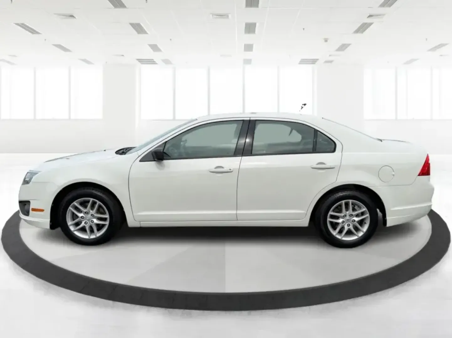 2012 Ford Fusion S (3FAHP0GA0CR) with an 2.5L L4 DOHC 16V engine, located at 1951 S Dayton Lakeview Rd., New Carlisle, OH, 45344, (937) 908-9800, 39.890999, -84.050255 - Need a reliable commuter that still feels comfortable for weekend getaways and everyday errands around Troy? This 2012 Ford Fusion S sedan is a smart pick for drivers who want a dependable, easy-to-live-with car for trips down I75, quick runs to the Troy Community Center, or relaxed evenings cruisin- Photo#5