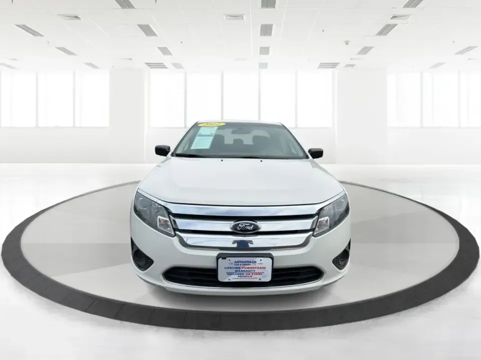2012 Ford Fusion S (3FAHP0GA0CR) with an 2.5L L4 DOHC 16V engine, located at 8750 N County Rd 25A, Piqua, OH, 45356, (937) 908-9800, 40.164391, -84.232513 - Need a reliable commuter that still feels comfortable for weekend getaways and everyday errands around Troy? This 2012 Ford Fusion S sedan is a smart pick for drivers who want a dependable, easy-to-live-with car for trips down I75, quick runs to the Troy Community Center, or relaxed evenings cruisin- Photo#7