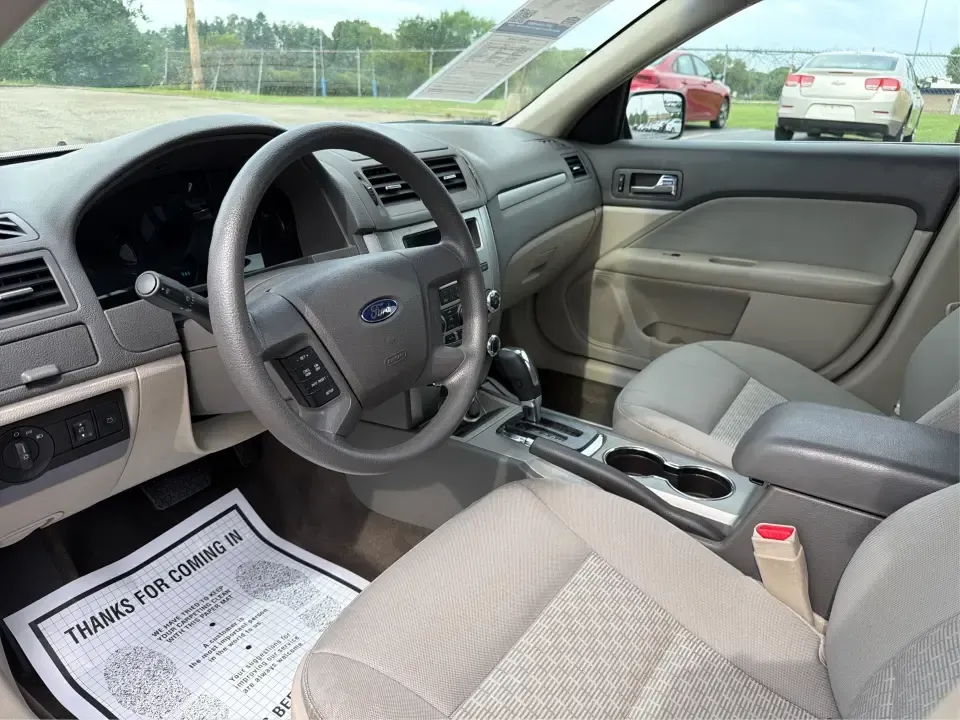 2012 Ford Fusion S (3FAHP0GA0CR) with an 2.5L L4 DOHC 16V engine, located at 8750 N County Rd 25A, Piqua, OH, 45356, (937) 908-9800, 40.164391, -84.232513 - Need a reliable commuter that still feels comfortable for weekend getaways and everyday errands around Troy? This 2012 Ford Fusion S sedan is a smart pick for drivers who want a dependable, easy-to-live-with car for trips down I75, quick runs to the Troy Community Center, or relaxed evenings cruisin- Photo#9