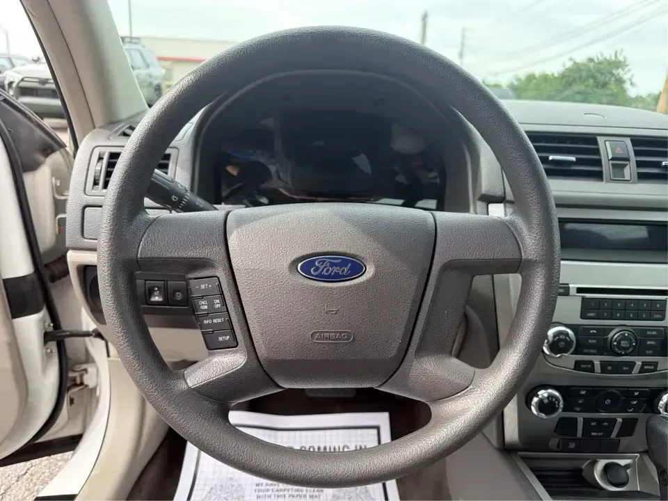 2012 Ford Fusion S (3FAHP0GA0CR) with an 2.5L L4 DOHC 16V engine, located at 8750 N County Rd 25A, Piqua, OH, 45356, (937) 908-9800, 40.164391, -84.232513 - Need a reliable commuter that still feels comfortable for weekend getaways and everyday errands around Troy? This 2012 Ford Fusion S sedan is a smart pick for drivers who want a dependable, easy-to-live-with car for trips down I75, quick runs to the Troy Community Center, or relaxed evenings cruisin- Photo#16