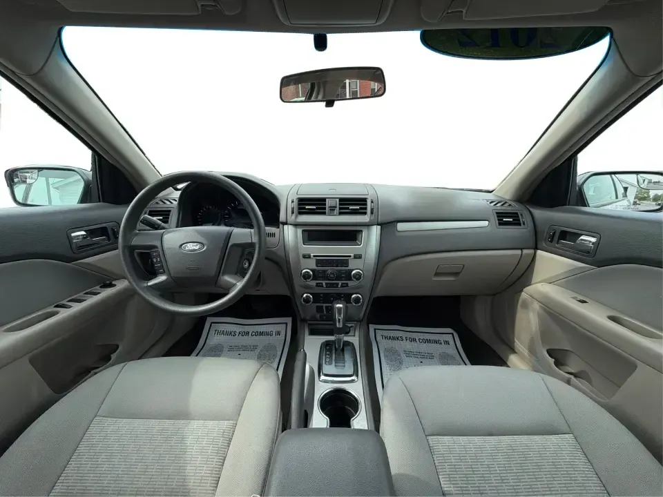 2012 Ford Fusion S (3FAHP0GA0CR) with an 2.5L L4 DOHC 16V engine, located at 8750 N County Rd 25A, Piqua, OH, 45356, (937) 908-9800, 40.164391, -84.232513 - Need a reliable commuter that still feels comfortable for weekend getaways and everyday errands around Troy? This 2012 Ford Fusion S sedan is a smart pick for drivers who want a dependable, easy-to-live-with car for trips down I75, quick runs to the Troy Community Center, or relaxed evenings cruisin- Photo#21