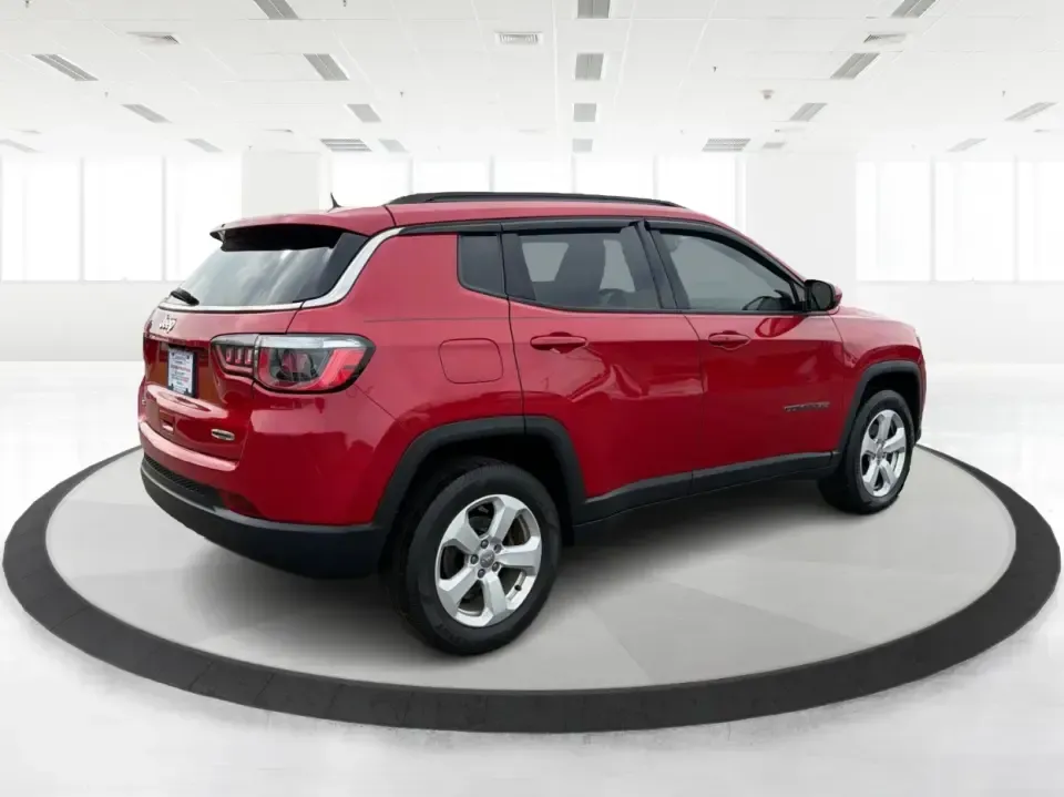 2019 Jeep Compass Sport 4WD (3C4NJDBB9KT) with an 2.4L L4 DOHC 16V engine, located at 1951 S Dayton Lakeview Rd., New Carlisle, OH, 45344, (937) 908-9800, 39.890999, -84.050255 - Picture your next Ohio road trip: loading up for a weekend at Buck Creek State Park, commuting down I70 toward Dayton, or navigating winter backroads around New Carlisle with confidence. This 2019 Jeep Compass Latitude 4x4 in striking Redline Pearlcoat is the kind of SUV that fits real life-comforta - Photo#2