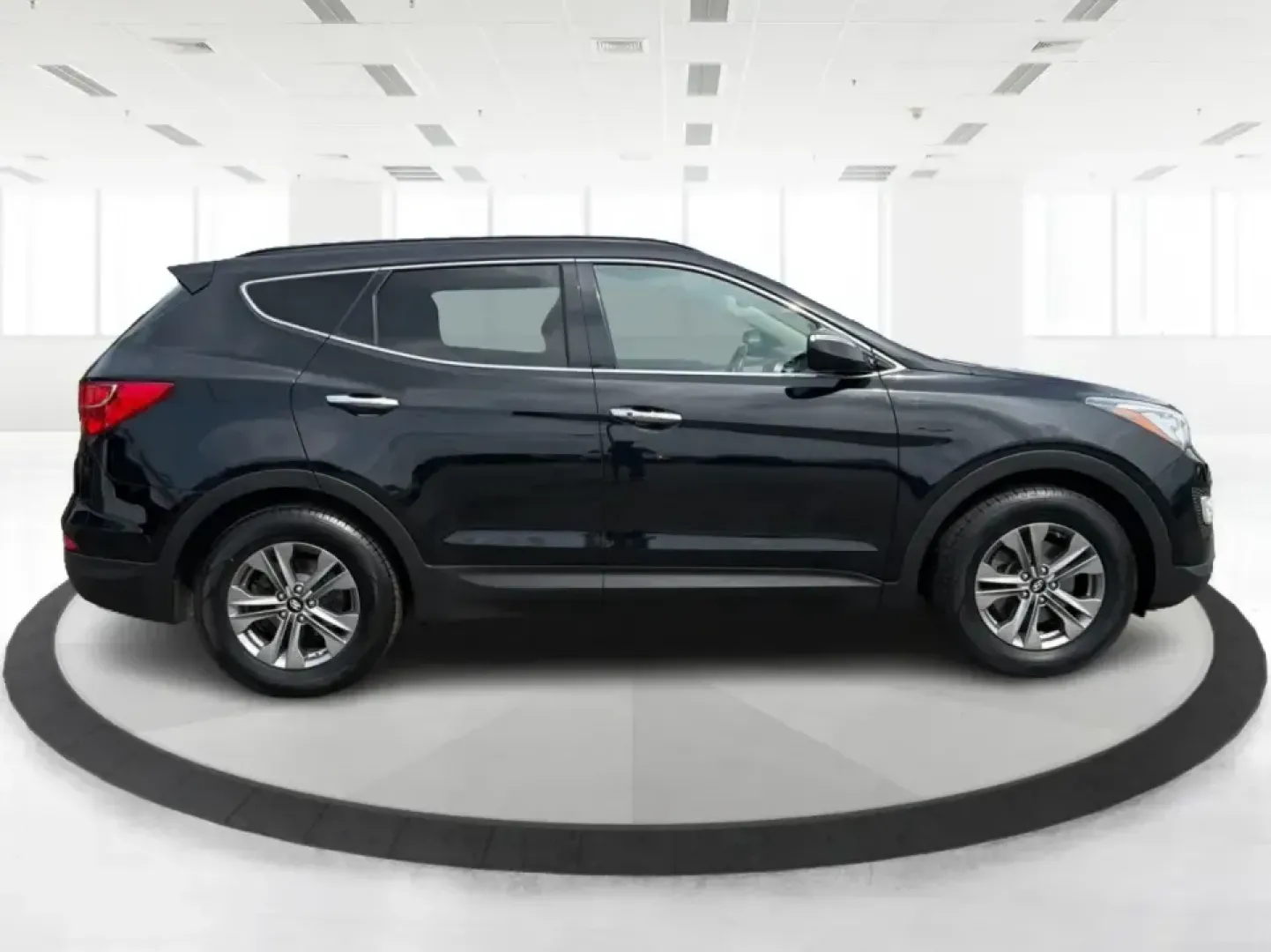 2016 Hyundai Santa Fe 2.4L (5XYZU3LB5GG) with an Theta II 2.4L I-4 gasoline direct injection engine, 6-Speed Automatic transmission, located at 1099 N County Rd 25A, Troy, OH, 45373, (937) 908-9800, 40.057079, -84.212883 - Load up the family, point the hood toward a weekend at John Bryan State Park, or make the daily commute from Xenia to Beavercreek feel more comfortable-this 2016 Hyundai Santa Fe 2.4L is the kind of SUV that fits real life. With three-row versatility in a right-sized footprint, it's ideal for school- Photo#1