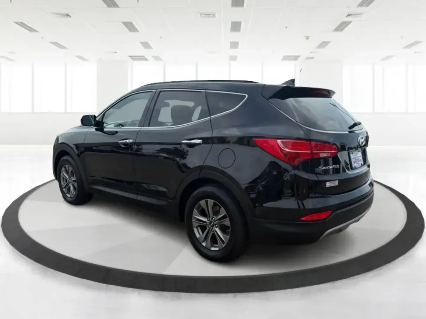 2016 Hyundai Santa Fe 2.4L (5XYZU3LB5GG) with an Theta II 2.4L I-4 gasoline direct injection engine, 6-Speed Automatic transmission, located at 1099 N County Rd 25A, Troy, OH, 45373, (937) 908-9800, 40.057079, -84.212883 - Load up the family, point the hood toward a weekend at John Bryan State Park, or make the daily commute from Xenia to Beavercreek feel more comfortable-this 2016 Hyundai Santa Fe 2.4L is the kind of SUV that fits real life. With three-row versatility in a right-sized footprint, it's ideal for school- Photo#4