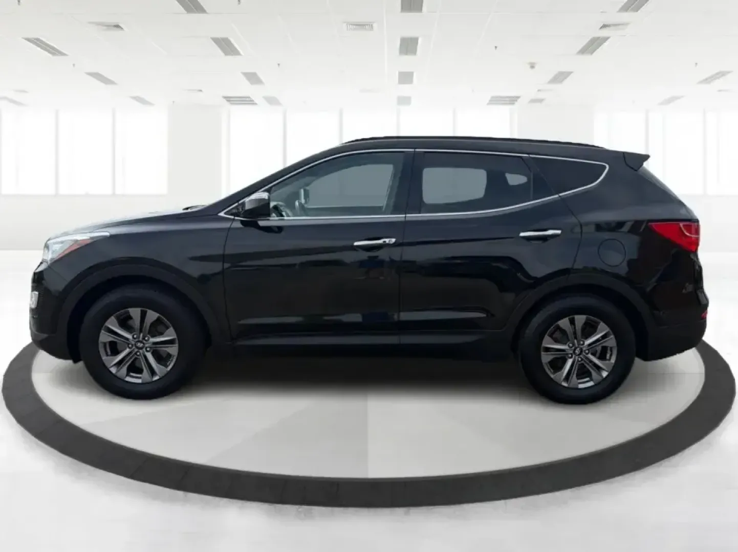 2016 Hyundai Santa Fe 2.4L (5XYZU3LB5GG) with an Theta II 2.4L I-4 gasoline direct injection engine, 6-Speed Automatic transmission, located at 1099 N County Rd 25A, Troy, OH, 45373, (937) 908-9800, 40.057079, -84.212883 - Load up the family, point the hood toward a weekend at John Bryan State Park, or make the daily commute from Xenia to Beavercreek feel more comfortable-this 2016 Hyundai Santa Fe 2.4L is the kind of SUV that fits real life. With three-row versatility in a right-sized footprint, it's ideal for school- Photo#5
