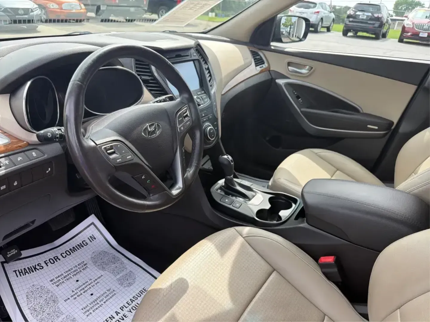 2016 Hyundai Santa Fe 2.4L (5XYZU3LB5GG) with an Theta II 2.4L I-4 gasoline direct injection engine, 6-Speed Automatic transmission, located at 1099 N County Rd 25A, Troy, OH, 45373, (937) 908-9800, 40.057079, -84.212883 - Load up the family, point the hood toward a weekend at John Bryan State Park, or make the daily commute from Xenia to Beavercreek feel more comfortable-this 2016 Hyundai Santa Fe 2.4L is the kind of SUV that fits real life. With three-row versatility in a right-sized footprint, it's ideal for school- Photo#9