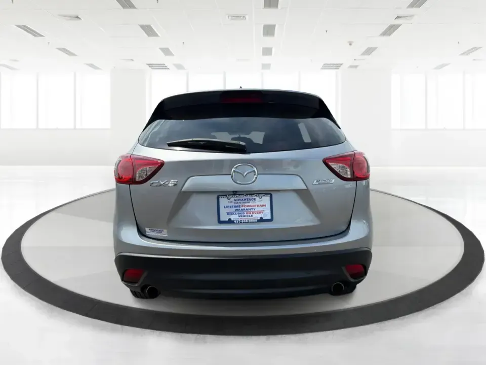2014 Mazda CX-5 Touring (JM3KE2CYXE0) with an SKYACTIV-G 2.5L I-4 gasoline direct injection engine, 6-Speed Automatic transmission, located at 401 Woodman Dr, Riverside, OH, 45431, (937) 908-9800, 39.760899, -84.123421 - Need one SUV that can handle the weekday commute, Saturday errands, and a spontaneous road trip to John Bryan State Park without feeling like a chore? This 2014 Mazda CX-5 Touring in Liquid Silver Metallic is a smart, practical crossover for drivers who want real-world versatility, comfortable seati - Photo#3