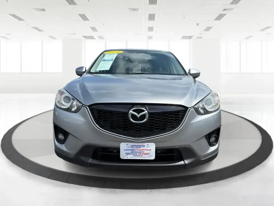 2014 Mazda CX-5 Touring (JM3KE2CYXE0) with an SKYACTIV-G 2.5L I-4 gasoline direct injection engine, 6-Speed Automatic transmission, located at 401 Woodman Dr, Riverside, OH, 45431, (937) 908-9800, 39.760899, -84.123421 - Need one SUV that can handle the weekday commute, Saturday errands, and a spontaneous road trip to John Bryan State Park without feeling like a chore? This 2014 Mazda CX-5 Touring in Liquid Silver Metallic is a smart, practical crossover for drivers who want real-world versatility, comfortable seati - Photo#7
