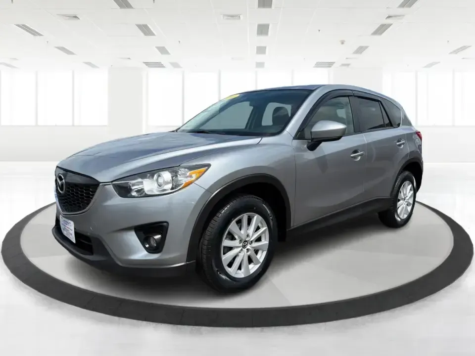 2014 Mazda CX-5 Touring (JM3KE2CYXE0) with an SKYACTIV-G 2.5L I-4 gasoline direct injection engine, 6-Speed Automatic transmission, located at 401 Woodman Dr, Riverside, OH, 45431, (937) 908-9800, 39.760899, -84.123421 - Need one SUV that can handle the weekday commute, Saturday errands, and a spontaneous road trip to John Bryan State Park without feeling like a chore? This 2014 Mazda CX-5 Touring in Liquid Silver Metallic is a smart, practical crossover for drivers who want real-world versatility, comfortable seati - Photo#8