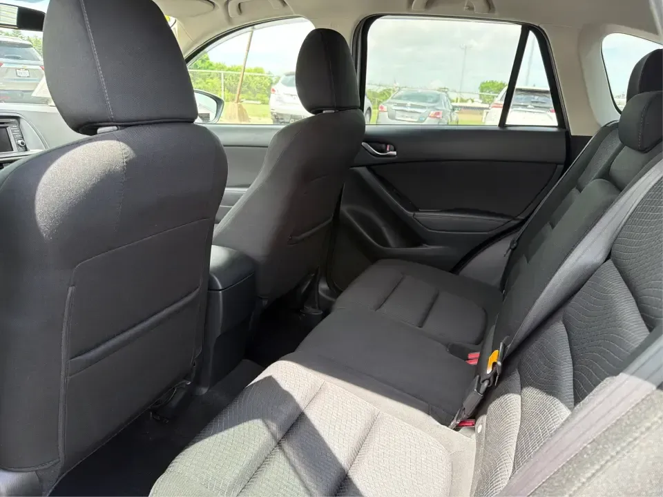 2014 Mazda CX-5 Touring (JM3KE2CYXE0) with an SKYACTIV-G 2.5L I-4 gasoline direct injection engine, 6-Speed Automatic transmission, located at 401 Woodman Dr, Riverside, OH, 45431, (937) 908-9800, 39.760899, -84.123421 - Need one SUV that can handle the weekday commute, Saturday errands, and a spontaneous road trip to John Bryan State Park without feeling like a chore? This 2014 Mazda CX-5 Touring in Liquid Silver Metallic is a smart, practical crossover for drivers who want real-world versatility, comfortable seati - Photo#10