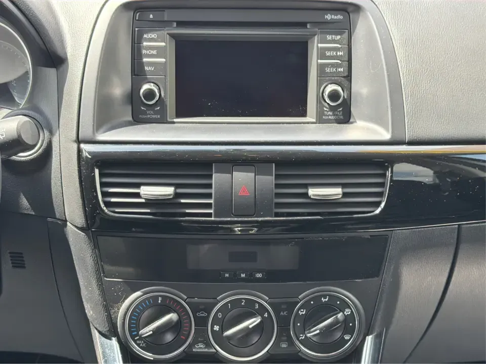 2014 Mazda CX-5 Touring (JM3KE2CYXE0) with an SKYACTIV-G 2.5L I-4 gasoline direct injection engine, 6-Speed Automatic transmission, located at 401 Woodman Dr, Riverside, OH, 45431, (937) 908-9800, 39.760899, -84.123421 - Need one SUV that can handle the weekday commute, Saturday errands, and a spontaneous road trip to John Bryan State Park without feeling like a chore? This 2014 Mazda CX-5 Touring in Liquid Silver Metallic is a smart, practical crossover for drivers who want real-world versatility, comfortable seati - Photo#13