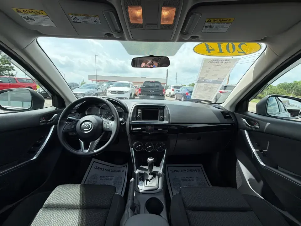 2014 Mazda CX-5 Touring (JM3KE2CYXE0) with an SKYACTIV-G 2.5L I-4 gasoline direct injection engine, 6-Speed Automatic transmission, located at 401 Woodman Dr, Riverside, OH, 45431, (937) 908-9800, 39.760899, -84.123421 - Need one SUV that can handle the weekday commute, Saturday errands, and a spontaneous road trip to John Bryan State Park without feeling like a chore? This 2014 Mazda CX-5 Touring in Liquid Silver Metallic is a smart, practical crossover for drivers who want real-world versatility, comfortable seati - Photo#20