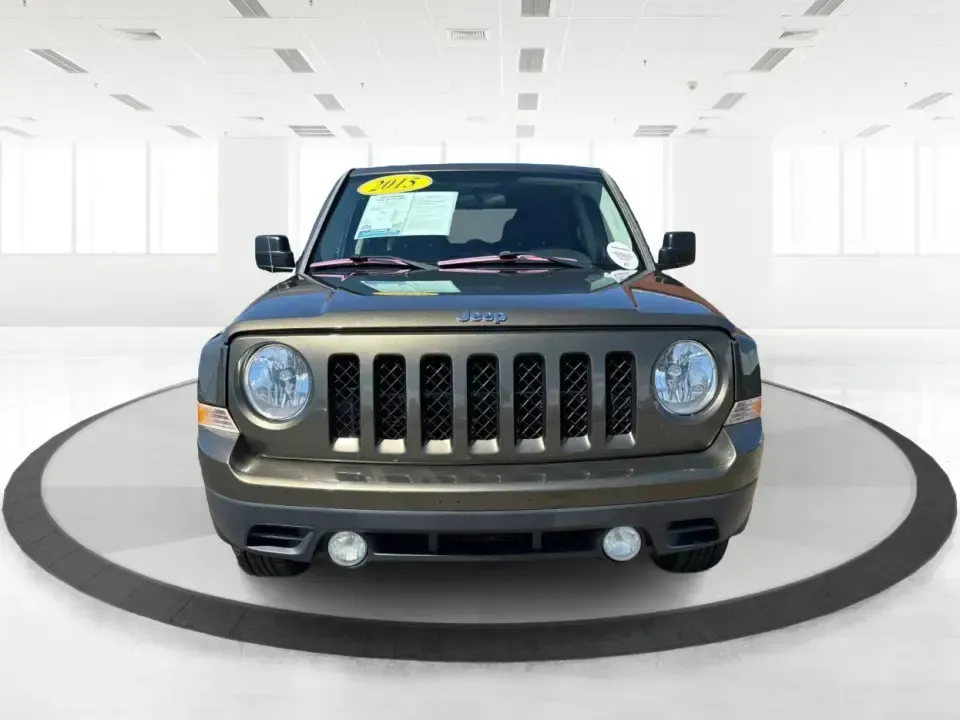 2015 Jeep Patriot Latitude 4WD (1C4NJRFB3FD) with an 2.4L L4 DOHC 16V engine, located at 8750 N County Rd 25A, Piqua, OH, 45356, (937) 908-9800, 40.164391, -84.232513 - When your weekends bounce between soccer fields, grocery runs, and quick getaways to the outdoors, you need an SUV that can handle everyday life without feeling like a chore. This 2015 Jeep Patriot Latitude 4WD is a practical, adventure-ready choice for Piqua-area drivers who want confident traction - Photo#7
