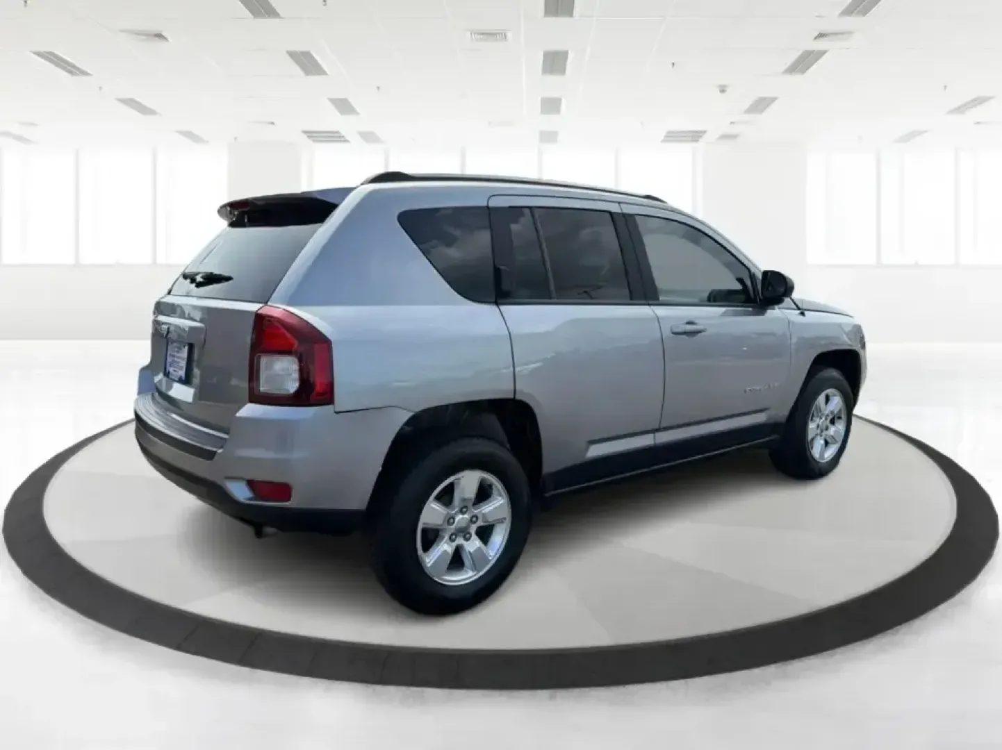 2015 Jeep Compass Sport FWD (1C4NJCBA6FD) with an 2.0L L4 DOHC 16V engine, located at 1951 S Dayton Lakeview Rd., New Carlisle, OH, 45344, (937) 908-9800, 39.890999, -84.050255 - Whether your week looks like a daily commute down I70, school drop-offs around Clark County, or a quick weekend escape to Buck Creek State Park, this **2015 Jeep Compass Sport FWD** is the kind of compact SUV that fits real life. With seating for **five**, easy-to-park sizing, and the versatile carg - Photo#2