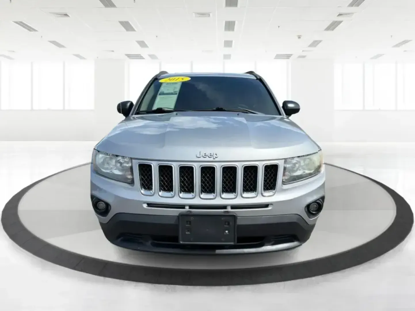 2015 Jeep Compass Sport FWD (1C4NJCBA6FD) with an 2.0L L4 DOHC 16V engine, located at 1951 S Dayton Lakeview Rd., New Carlisle, OH, 45344, (937) 908-9800, 39.890999, -84.050255 - Whether your week looks like a daily commute down I70, school drop-offs around Clark County, or a quick weekend escape to Buck Creek State Park, this **2015 Jeep Compass Sport FWD** is the kind of compact SUV that fits real life. With seating for **five**, easy-to-park sizing, and the versatile carg - Photo#7