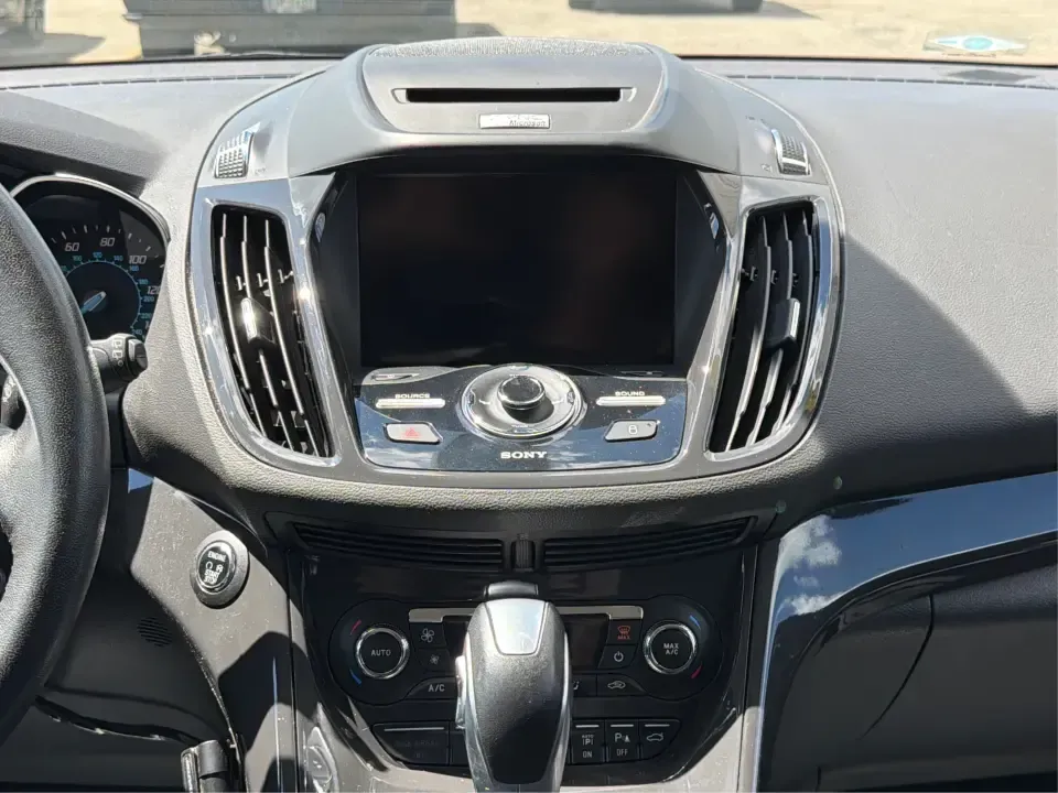 2014 Ford Escape Titanium 4WD (1FMCU9J91EU) with an 2.0L L4 DOHC 16V engine, 6-Speed Automatic transmission, located at 1099 N County Rd 25A, Troy, OH, 45373, (937) 908-9800, 40.057079, -84.212883 - Weekend getaways to Hocking Hills, snowy commutes up I75, or the everyday school-and-grocery loop around Troy-this 2014 Ford Escape Titanium 4WD is built for the kind of life that doesn't slow down when the weather changes. With seating for five, flexible cargo space, and confident four-wheel drive,- Photo#13