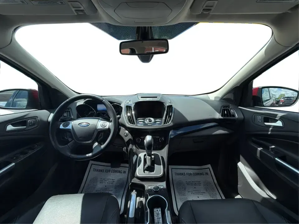 2014 Ford Escape Titanium 4WD (1FMCU9J91EU) with an 2.0L L4 DOHC 16V engine, 6-Speed Automatic transmission, located at 1099 N County Rd 25A, Troy, OH, 45373, (937) 908-9800, 40.057079, -84.212883 - Weekend getaways to Hocking Hills, snowy commutes up I75, or the everyday school-and-grocery loop around Troy-this 2014 Ford Escape Titanium 4WD is built for the kind of life that doesn't slow down when the weather changes. With seating for five, flexible cargo space, and confident four-wheel drive,- Photo#22