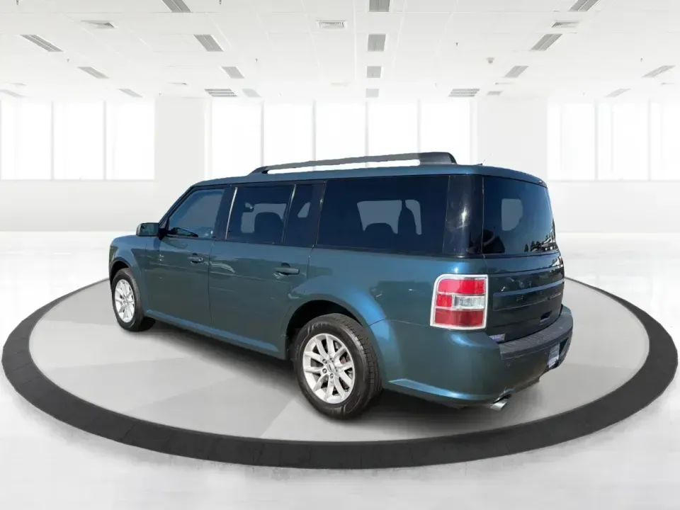 2016 Ford Flex SE FWD (2FMGK5B81GB) with an 3.5L V6 DOHC 24V engine, 6A transmission, located at 1099 N County Rd 25A, Troy, OH, 45373, (937) 908-9800, 40.057079, -84.212883 - Need one vehicle that can handle school drop-offs, long commutes down I75, and a full weekend of gear for a trip to Charleston Falls Preserve? This 2016 Ford Flex SE FWD is built for real life in Troy, Ohio-roomy for growing families, comfortable for daily drivers, and flexible (pun intended) for an - Photo#4