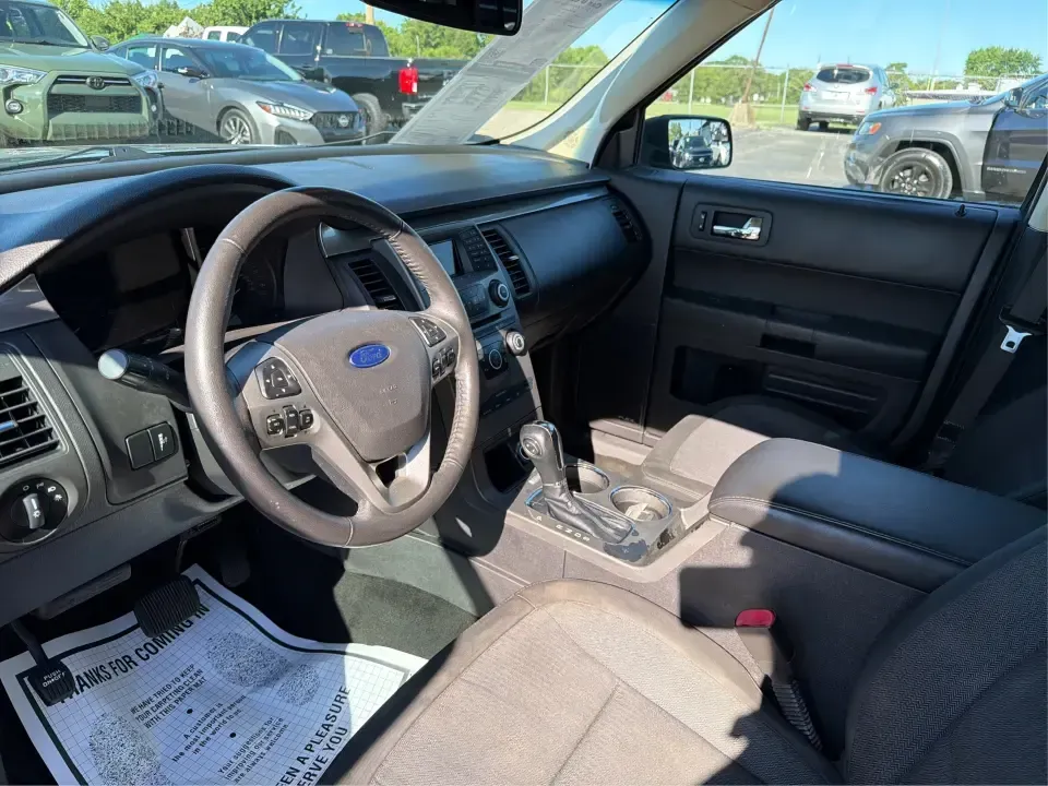 2016 Ford Flex SE FWD (2FMGK5B81GB) with an 3.5L V6 DOHC 24V engine, 6A transmission, located at 1099 N County Rd 25A, Troy, OH, 45373, (937) 908-9800, 40.057079, -84.212883 - Need one vehicle that can handle school drop-offs, long commutes down I75, and a full weekend of gear for a trip to Charleston Falls Preserve? This 2016 Ford Flex SE FWD is built for real life in Troy, Ohio-roomy for growing families, comfortable for daily drivers, and flexible (pun intended) for an - Photo#9