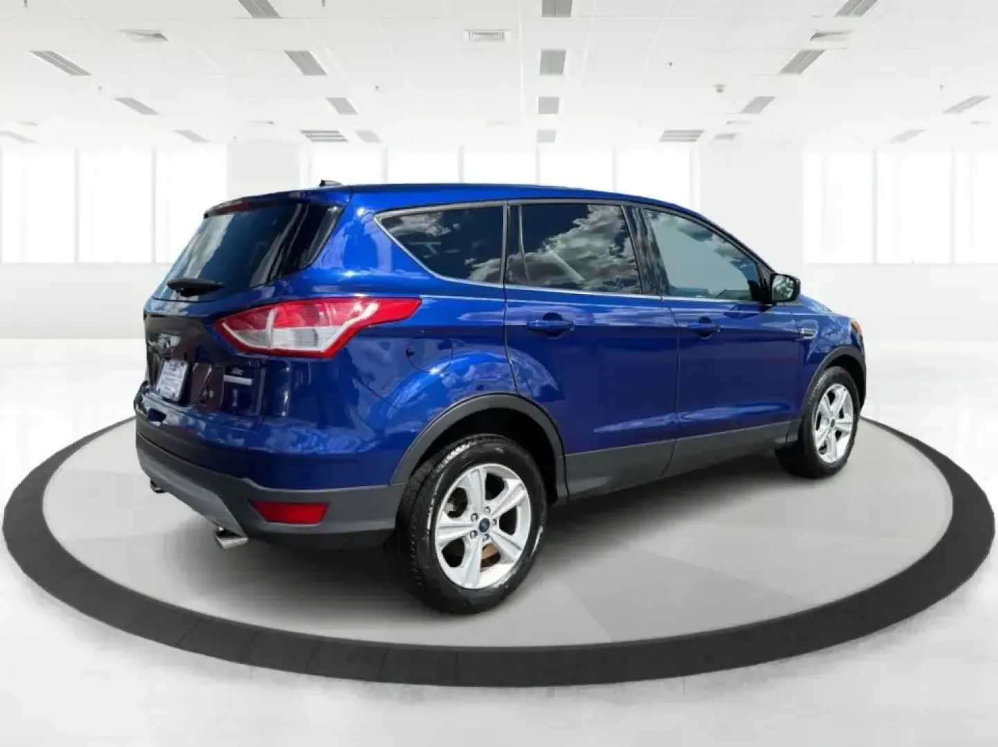 2016 Ford Escape SE FWD (1FMCU0G94GU) with an 2.0L L4 DOHC 16V engine, 6-Speed Automatic transmission, located at 1099 N County Rd 25A, Troy, OH, 45373, (937) 908-9800, 40.057079, -84.212883 - Pack up the kids, load the groceries, or point the nose toward a weekend getaway-this 2016 Ford Escape SE FWD is the kind of compact SUV that fits real life in Troy, Ohio. With seating for five, versatile cargo space, and fuel-friendly efficiency (23 city / 32 highway MPG), it's a smart match for co- Photo#2