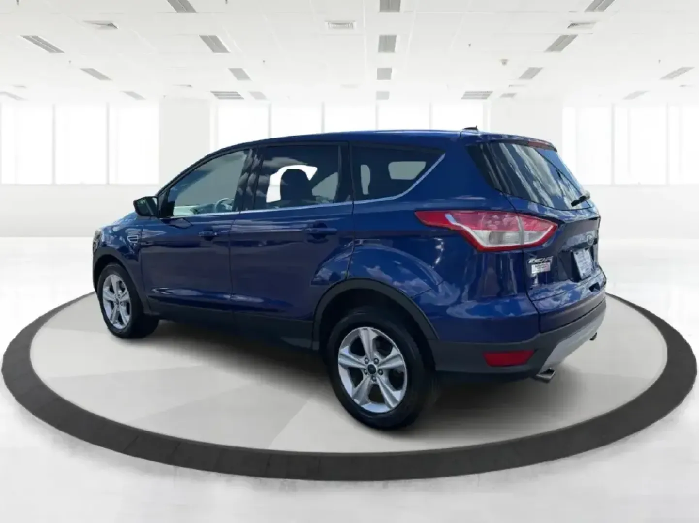 2016 Ford Escape SE FWD (1FMCU0G94GU) with an 2.0L L4 DOHC 16V engine, 6-Speed Automatic transmission, located at 1099 N County Rd 25A, Troy, OH, 45373, (937) 908-9800, 40.057079, -84.212883 - Pack up the kids, load the groceries, or point the nose toward a weekend getaway-this 2016 Ford Escape SE FWD is the kind of compact SUV that fits real life in Troy, Ohio. With seating for five, versatile cargo space, and fuel-friendly efficiency (23 city / 32 highway MPG), it's a smart match for co- Photo#4