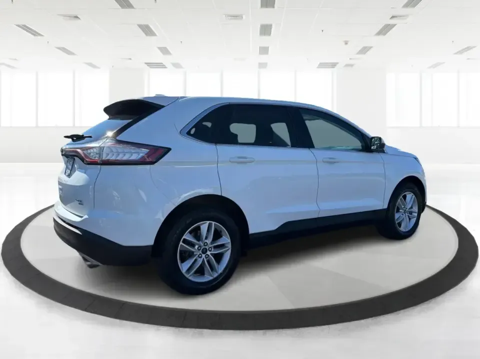 2015 Ford Edge SEL AWD (2FMTK4J87FB) with an 3.5L V6 DOHC 24V engine, 6-Speed Automatic transmission, located at 1184 Kauffman Ave, Fairborn, OH, 45324, (937) 908-9800, 39.807072, -84.030914 - Weekend road trips to Yellow Springs, snowy commutes to Wright-Patterson AFB, and everyday school-drop runs around Fairborn all call for an SUV that feels confident, comfortable, and easy to live with. This 2015 Ford Edge SEL AWD is built for real life in Ohio-room for five, versatile cargo space, a- Photo#2