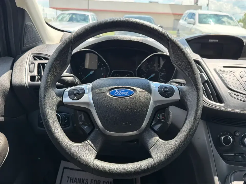 2014 Ford Escape S FWD (1FMCU0F75EU) with an 2.5L L4 DOHC 16V engine, 6-Speed Automatic transmission, located at 1184 Kauffman Ave, Fairborn, OH, 45324, (937) 908-9800, 39.807072, -84.030914 - Need a practical SUV that fits real life in the Miami Valley-school drop-offs, Wright-Patterson AFB commutes, grocery runs, and weekend getaways to John Bryan State Park? This 2014 Ford Escape S FWD in Oxford White is a smart, budget-friendly choice with the versatility to handle busy schedules and- Photo#16