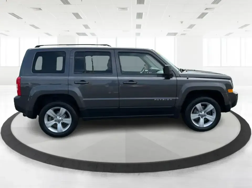 2014 Jeep Patriot Latitude 4WD (1C4NJRFB6ED) with an 2.4L L4 DOHC 16V engine, located at 1230 East Main St, Xenia, OH, 45385, (937) 908-9800, 39.688026, -83.910172 - Weekend escapes to John Bryan State Park, winter commutes down US-35, or everyday family errands around Xenia-this 2014 Jeep Patriot Latitude 4WD is built for the kind of Ohio life that doesn't stop when the weather changes. With confident four-wheel drive, practical SUV space for five, and a comfor - Photo#1