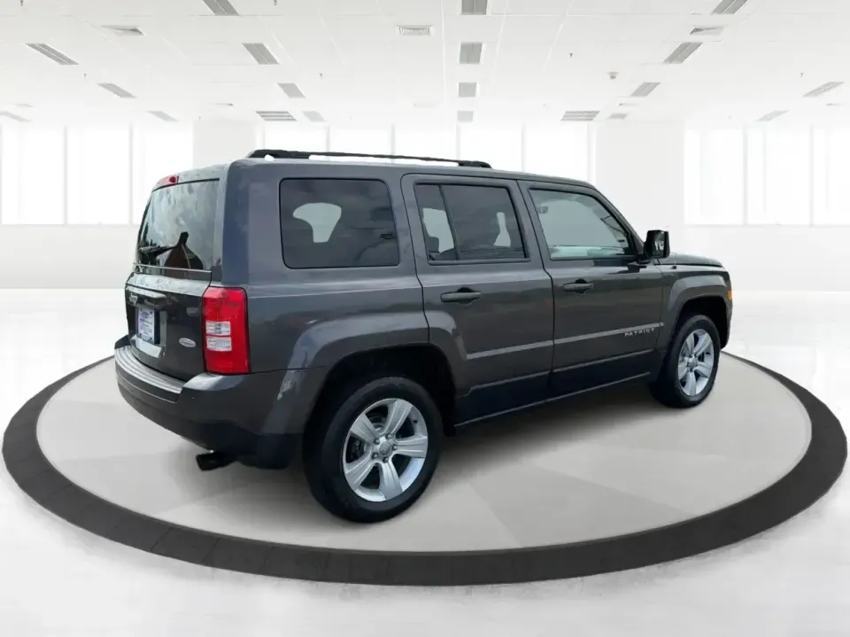 2014 Jeep Patriot Latitude 4WD (1C4NJRFB6ED) with an 2.4L L4 DOHC 16V engine, located at 1230 East Main St, Xenia, OH, 45385, (937) 908-9800, 39.688026, -83.910172 - Weekend escapes to John Bryan State Park, winter commutes down US-35, or everyday family errands around Xenia-this 2014 Jeep Patriot Latitude 4WD is built for the kind of Ohio life that doesn't stop when the weather changes. With confident four-wheel drive, practical SUV space for five, and a comfor - Photo#2