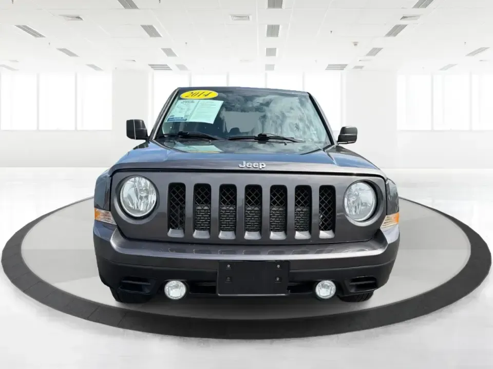 2014 Jeep Patriot Latitude 4WD (1C4NJRFB6ED) with an 2.4L L4 DOHC 16V engine, located at 1230 East Main St, Xenia, OH, 45385, (937) 908-9800, 39.688026, -83.910172 - Weekend escapes to John Bryan State Park, winter commutes down US-35, or everyday family errands around Xenia-this 2014 Jeep Patriot Latitude 4WD is built for the kind of Ohio life that doesn't stop when the weather changes. With confident four-wheel drive, practical SUV space for five, and a comfor - Photo#7