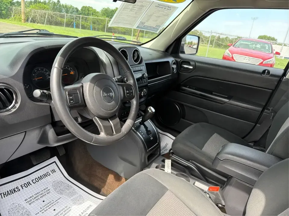 2014 Jeep Patriot Latitude 4WD (1C4NJRFB6ED) with an 2.4L L4 DOHC 16V engine, located at 1230 East Main St, Xenia, OH, 45385, (937) 908-9800, 39.688026, -83.910172 - Weekend escapes to John Bryan State Park, winter commutes down US-35, or everyday family errands around Xenia-this 2014 Jeep Patriot Latitude 4WD is built for the kind of Ohio life that doesn't stop when the weather changes. With confident four-wheel drive, practical SUV space for five, and a comfor - Photo#9