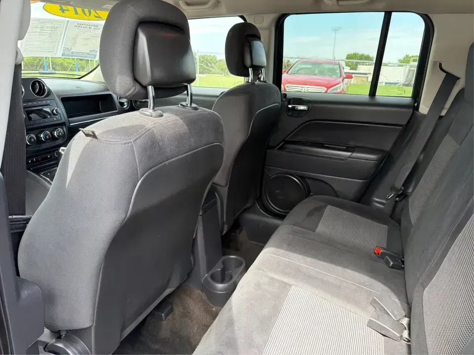 2014 Jeep Patriot Latitude 4WD (1C4NJRFB6ED) with an 2.4L L4 DOHC 16V engine, located at 1230 East Main St, Xenia, OH, 45385, (937) 908-9800, 39.688026, -83.910172 - Weekend escapes to John Bryan State Park, winter commutes down US-35, or everyday family errands around Xenia-this 2014 Jeep Patriot Latitude 4WD is built for the kind of Ohio life that doesn't stop when the weather changes. With confident four-wheel drive, practical SUV space for five, and a comfor - Photo#10