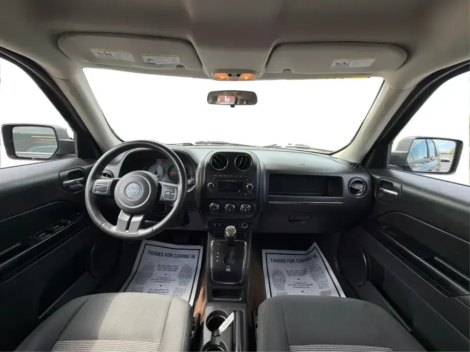 2014 Jeep Patriot Latitude 4WD (1C4NJRFB6ED) with an 2.4L L4 DOHC 16V engine, located at 1230 East Main St, Xenia, OH, 45385, (937) 908-9800, 39.688026, -83.910172 - Weekend escapes to John Bryan State Park, winter commutes down US-35, or everyday family errands around Xenia-this 2014 Jeep Patriot Latitude 4WD is built for the kind of Ohio life that doesn't stop when the weather changes. With confident four-wheel drive, practical SUV space for five, and a comfor - Photo#19