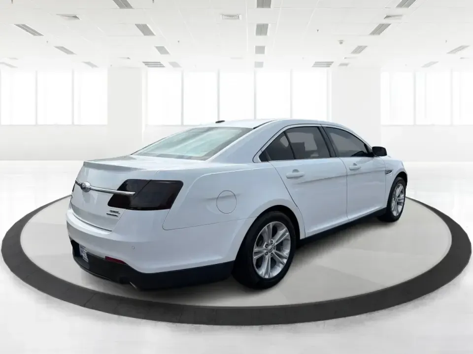2015 Ford Taurus SEL FWD (1FAHP2E89FG) with an 3.5L V6 DOHC 24V engine, 6-Speed Automatic transmission, located at 1951 S Dayton Lakeview Rd., New Carlisle, OH, 45344, (937) 908-9800, 39.890999, -84.050255 - Need a comfortable, confident sedan for the daily commute, school drop-offs, and the occasional Dayton-to-Columbus road trip? This 2015 Ford Taurus SEL FWD is built for real life-roomy for five, smooth on longer drives, and packed with the kind of features that make every mile feel easier, whether y- Photo#2