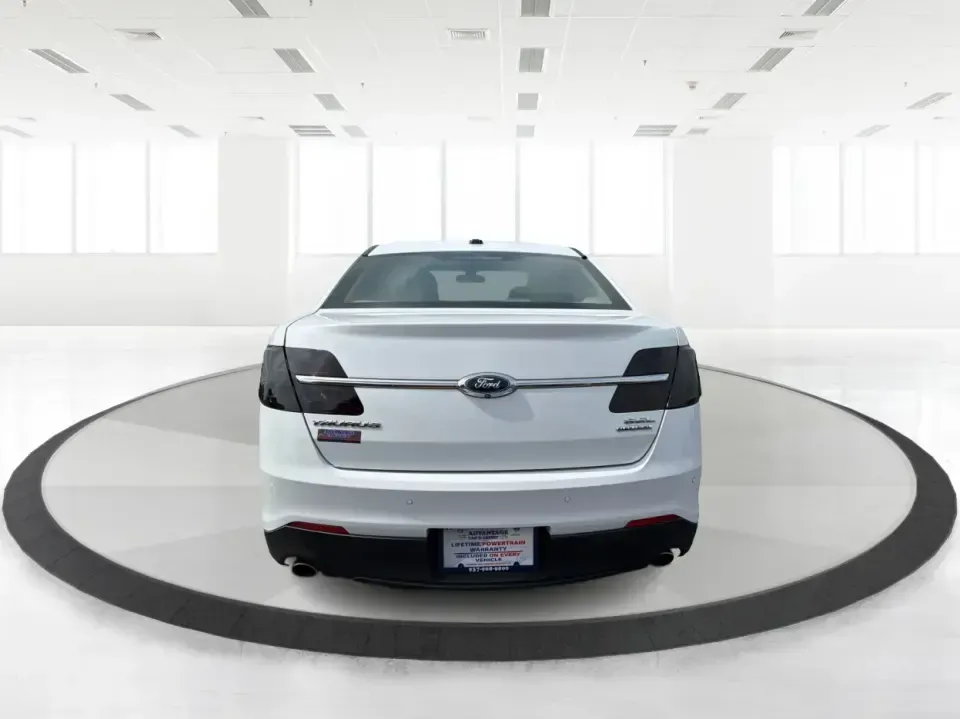 2015 Ford Taurus SEL FWD (1FAHP2E89FG) with an 3.5L V6 DOHC 24V engine, 6-Speed Automatic transmission, located at 1951 S Dayton Lakeview Rd., New Carlisle, OH, 45344, (937) 908-9800, 39.890999, -84.050255 - Need a comfortable, confident sedan for the daily commute, school drop-offs, and the occasional Dayton-to-Columbus road trip? This 2015 Ford Taurus SEL FWD is built for real life-roomy for five, smooth on longer drives, and packed with the kind of features that make every mile feel easier, whether y- Photo#3