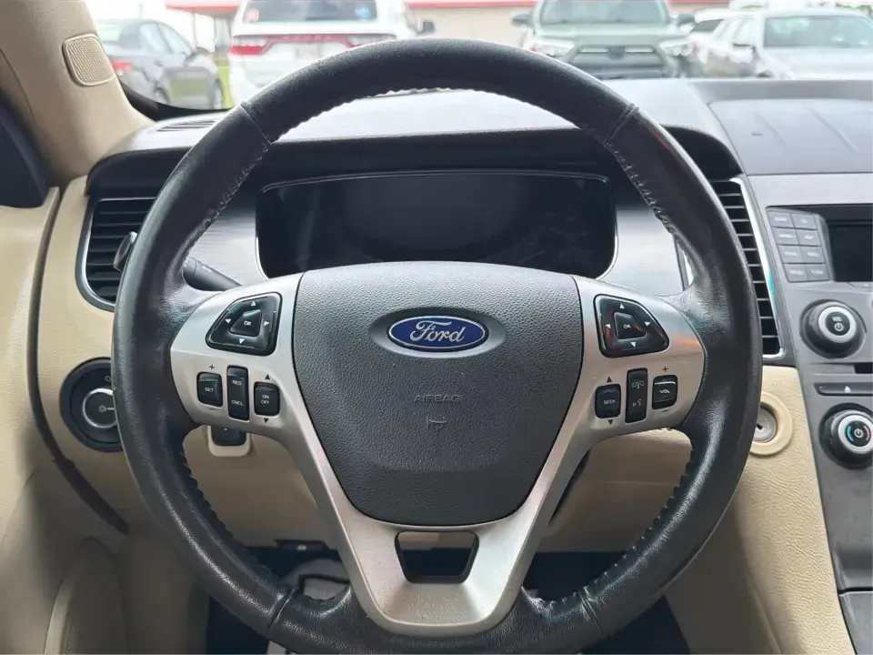2015 Ford Taurus SEL FWD (1FAHP2E89FG) with an 3.5L V6 DOHC 24V engine, 6-Speed Automatic transmission, located at 1951 S Dayton Lakeview Rd., New Carlisle, OH, 45344, (937) 908-9800, 39.890999, -84.050255 - Need a comfortable, confident sedan for the daily commute, school drop-offs, and the occasional Dayton-to-Columbus road trip? This 2015 Ford Taurus SEL FWD is built for real life-roomy for five, smooth on longer drives, and packed with the kind of features that make every mile feel easier, whether y- Photo#16