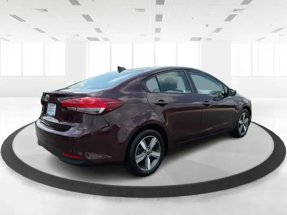 2018 Kia Forte LX 6M (3KPFL4A79JE) with an 2.0L L4 DOHC 16V engine, 6M transmission, located at 1951 S Dayton Lakeview Rd., New Carlisle, OH, 45344, (937) 908-9800, 39.890999, -84.050255 - Need a dependable commuter that still feels comfortable for date night in Dayton, errands in Springfield, and quick weekend getaways toward Yellow Springs? This **2018 Kia Forte LX 6M** is a smart, budget-friendly sedan that fits real life in **New Carlisle, Ohio**-easy to park, efficient to run, an- Photo#2
