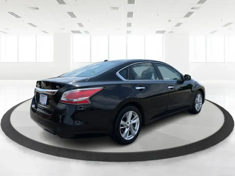 2015 Nissan Altima 2.5 S (1N4AL3AP1FN) with an 2.5L L4 DOHC 16V engine, Continuously Variable Transmission transmission, located at 401 Woodman Dr, Riverside, OH, 45431, (937) 908-9800, 39.760899, -84.123421 - Need a dependable sedan for the daily commute down I-675, quick school drop-offs, and easy weekend runs to The Greene or Downtown Dayton? This 2015 Nissan Altima 2.5 S in Super Black fits that real-life rhythm with excellent fuel economy, comfortable seating for five, and the kind of driver-friendly- Photo#2