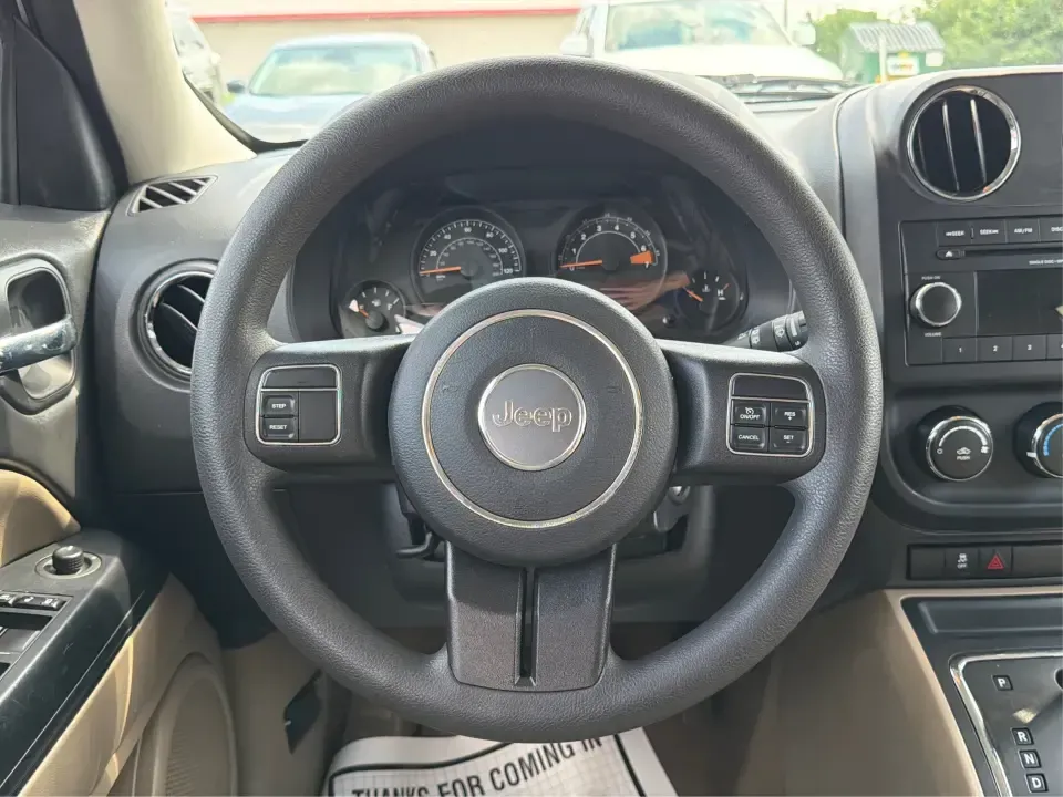 2015 Jeep Patriot Sport 4WD (1C4NJRBB1FD) with an 2.4L L4 DOHC 16V engine, located at 1184 Kauffman Ave, Fairborn, OH, 45324, (937) 908-9800, 39.807072, -84.030914 - Weekend lake days at Huffman Prairie, snowy commutes to Wright-Patterson AFB, or a packed-backseat run to The Greene-this 2015 Jeep Patriot Sport 4WD is built for Fairborn life when you want SUV versatility without giving up everyday practicality. With confident four-wheel drive and a manageable siz- Photo#16