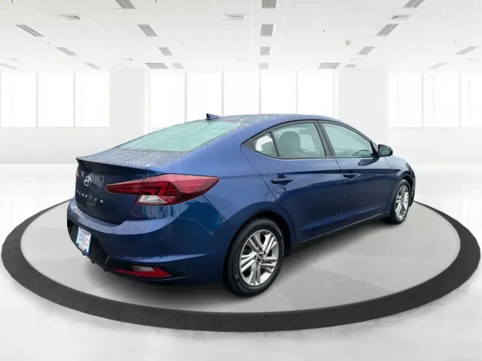 2019 Hyundai Elantra Limited (5NPD84LF6KH) with an 1.8L L4 DOHC 16V engine, 6A transmission, located at 880 E. National Road, Vandalia, OH, 45377, (937) 908-9800, 39.891918, -84.183594 - Need a reliable commuter that still feels comfortable for date night in Dayton, errands in Huber Heights, and weekend drives out toward Englewood MetroPark? This 2019 Hyundai Elantra Limited in eye-catching Lakeside Blue is the kind of practical, fuel-friendly sedan that fits real life-easy to park,- Photo#2