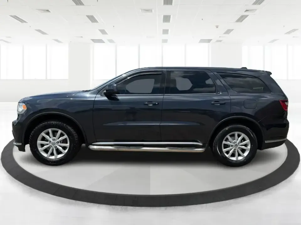 2015 Dodge Durango SXT AWD (1C4RDJAGXFC) with an 3.6L V6 DOHC 24V engine, 8-Speed Automatic transmission, located at 8750 N County Rd 25A, Piqua, OH, 45356, (937) 908-9800, 40.164391, -84.232513 - Need one SUV that can handle the school run, a long I75 commute, and a packed weekend at Indian Lake without feeling cramped? This 2015 Dodge Durango SXT AWD is built for real life in West Central Ohio-roomy for up to seven passengers, confident in changing weather, and versatile enough for everythi- Photo#5