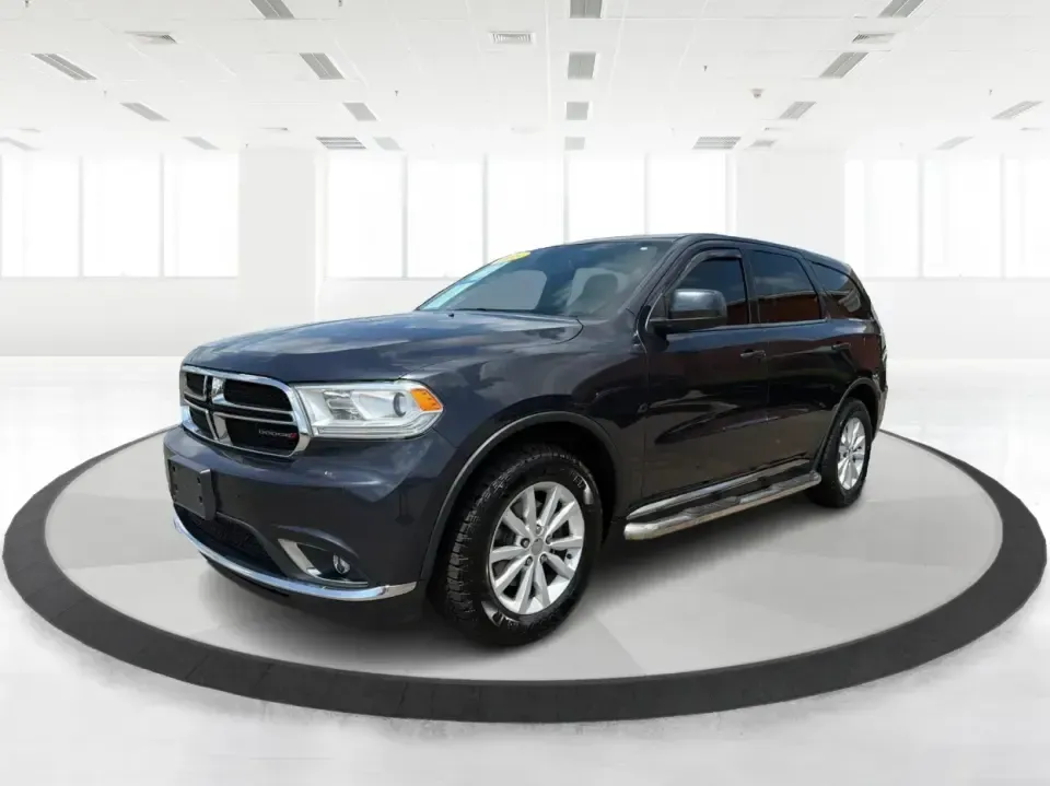 2015 Dodge Durango SXT AWD (1C4RDJAGXFC) with an 3.6L V6 DOHC 24V engine, 8-Speed Automatic transmission, located at 8750 N County Rd 25A, Piqua, OH, 45356, (937) 908-9800, 40.164391, -84.232513 - Need one SUV that can handle the school run, a long I75 commute, and a packed weekend at Indian Lake without feeling cramped? This 2015 Dodge Durango SXT AWD is built for real life in West Central Ohio-roomy for up to seven passengers, confident in changing weather, and versatile enough for everythi- Photo#8