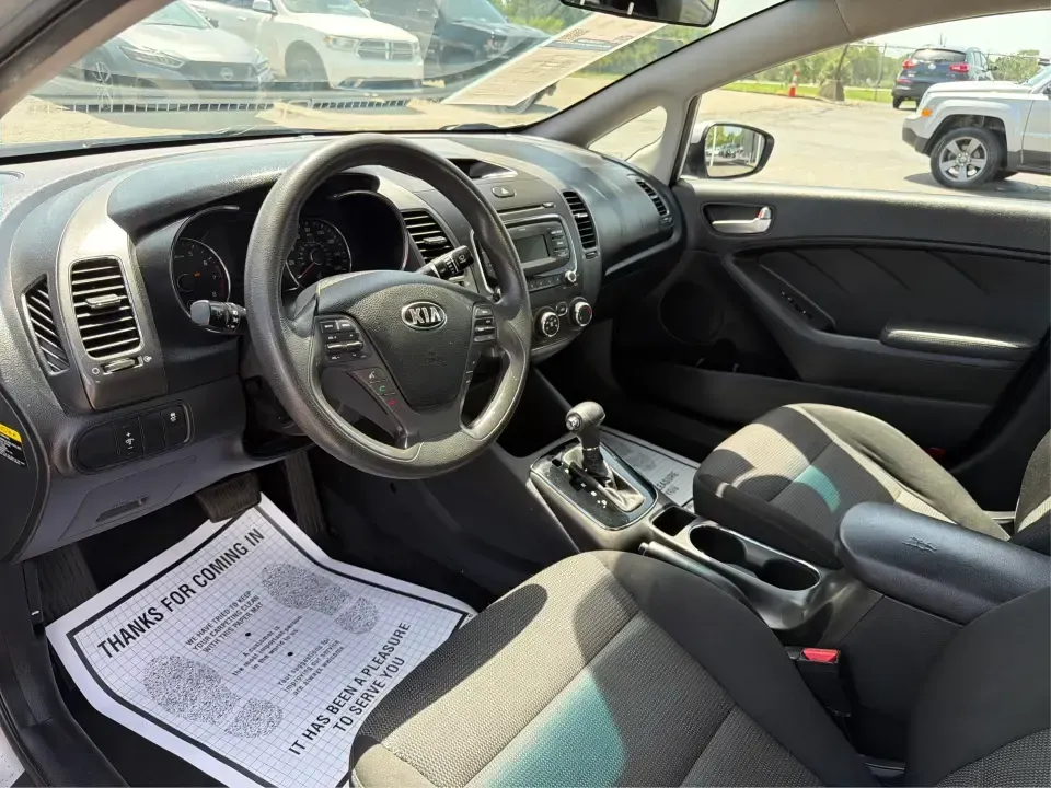 2018 Kia Forte LX 6M (3KPFK4A73JE) with an 2.0L L4 DOHC 16V engine, 6M transmission, located at 1230 East Main St, Xenia, OH, 45385, (937) 908-9800, 39.688026, -83.910172 - Whether you're tackling a daily commute from Xenia to Beavercreek, shuttling kids to practices near Shawnee Park, or planning an easy weekend drive out toward Caesar Creek State Park, this 2018 Kia Forte LX 6M is a smart, practical sedan built for real-life miles. With its efficient footprint, comfo- Photo#9
