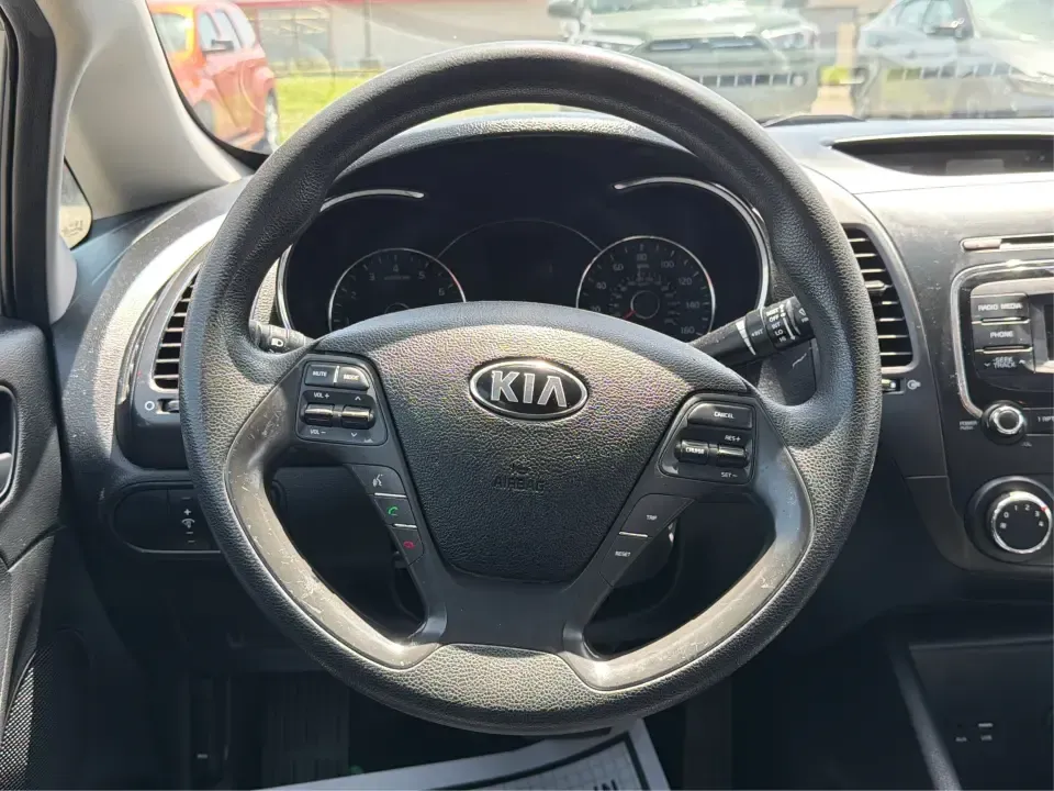 2018 Kia Forte LX 6M (3KPFK4A73JE) with an 2.0L L4 DOHC 16V engine, 6M transmission, located at 1230 East Main St, Xenia, OH, 45385, (937) 908-9800, 39.688026, -83.910172 - Whether you're tackling a daily commute from Xenia to Beavercreek, shuttling kids to practices near Shawnee Park, or planning an easy weekend drive out toward Caesar Creek State Park, this 2018 Kia Forte LX 6M is a smart, practical sedan built for real-life miles. With its efficient footprint, comfo- Photo#16