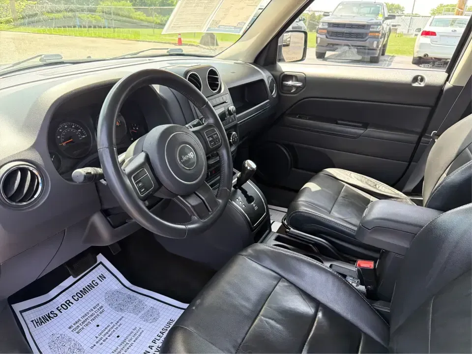 2015 Jeep Patriot Latitude 4WD (1C4NJRFB0FD) with an 2.4L L4 DOHC 16V engine, located at 1230 East Main St, Xenia, OH, 45385, (937) 908-9800, 39.688026, -83.910172 - Weekend getaways, snowy school runs, and everyday commuting around Greene County feel a lot more doable in a compact SUV that's ready for whatever Ohio weather throws your way. If you're looking for a versatile ride that can handle errands in town, a trip out to Caesar Creek, or the back roads leadi- Photo#9